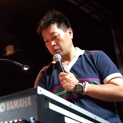 音声　田中 貢
